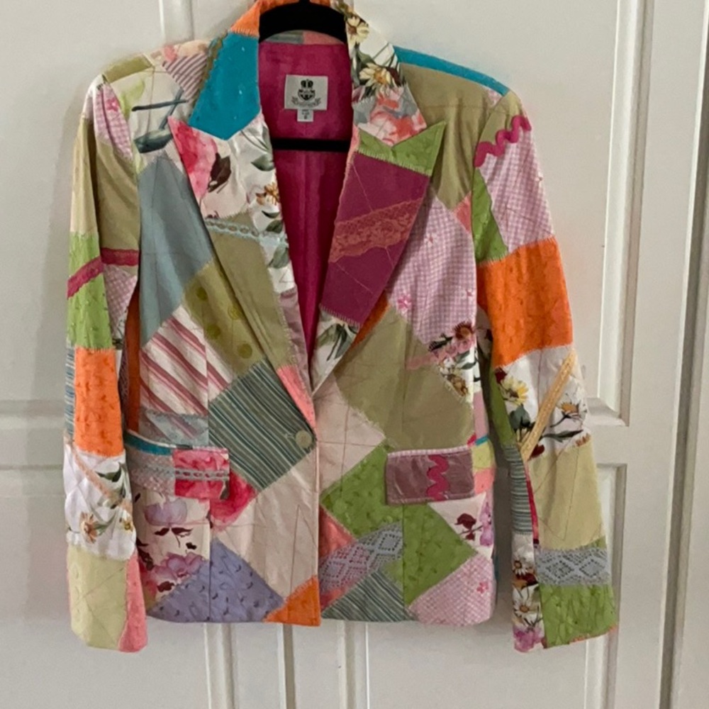 Beautiful multicolor appliqué jacket.